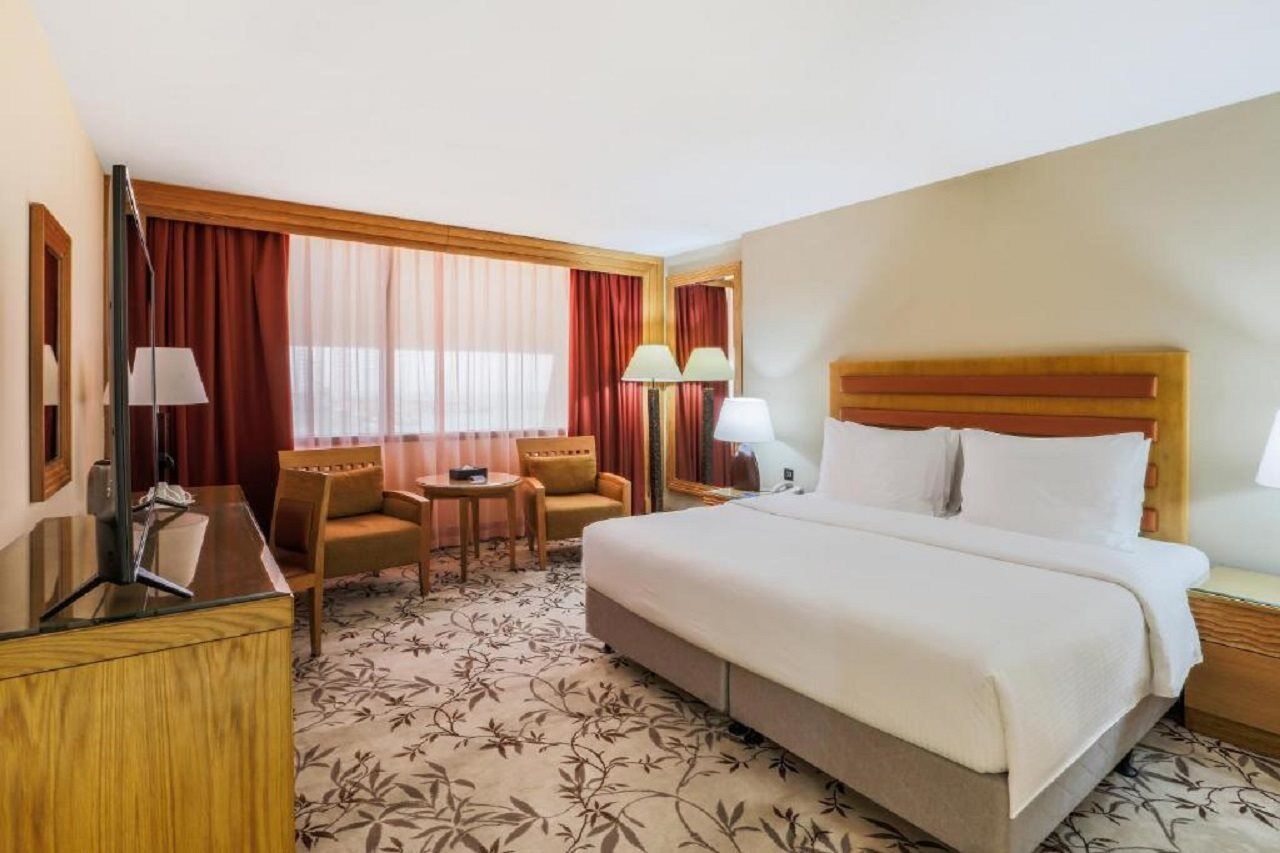 Radisson Blu Resort, Шарджа Экстерьер фото A room at the hotel