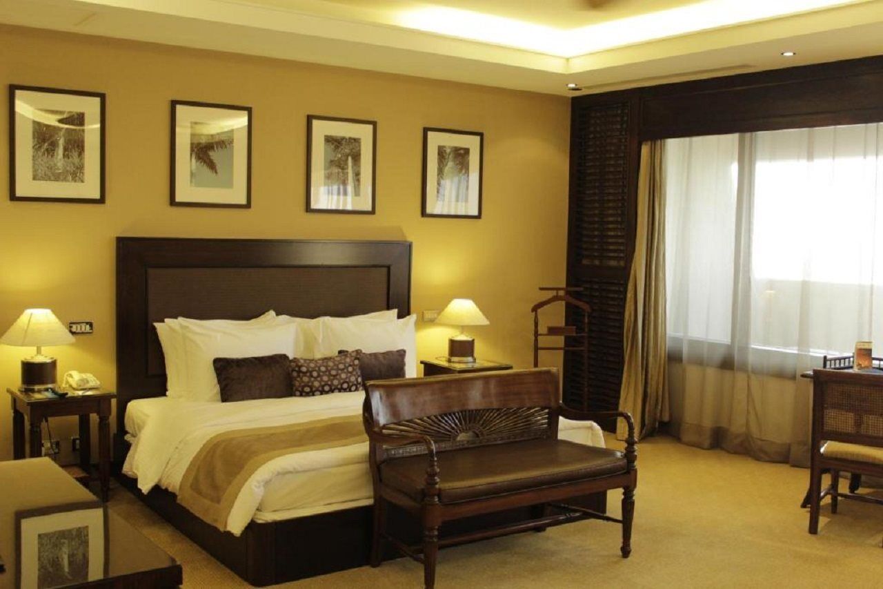Radisson Blu Resort, Шарджа Экстерьер фото A bedroom at the Taj Bengal