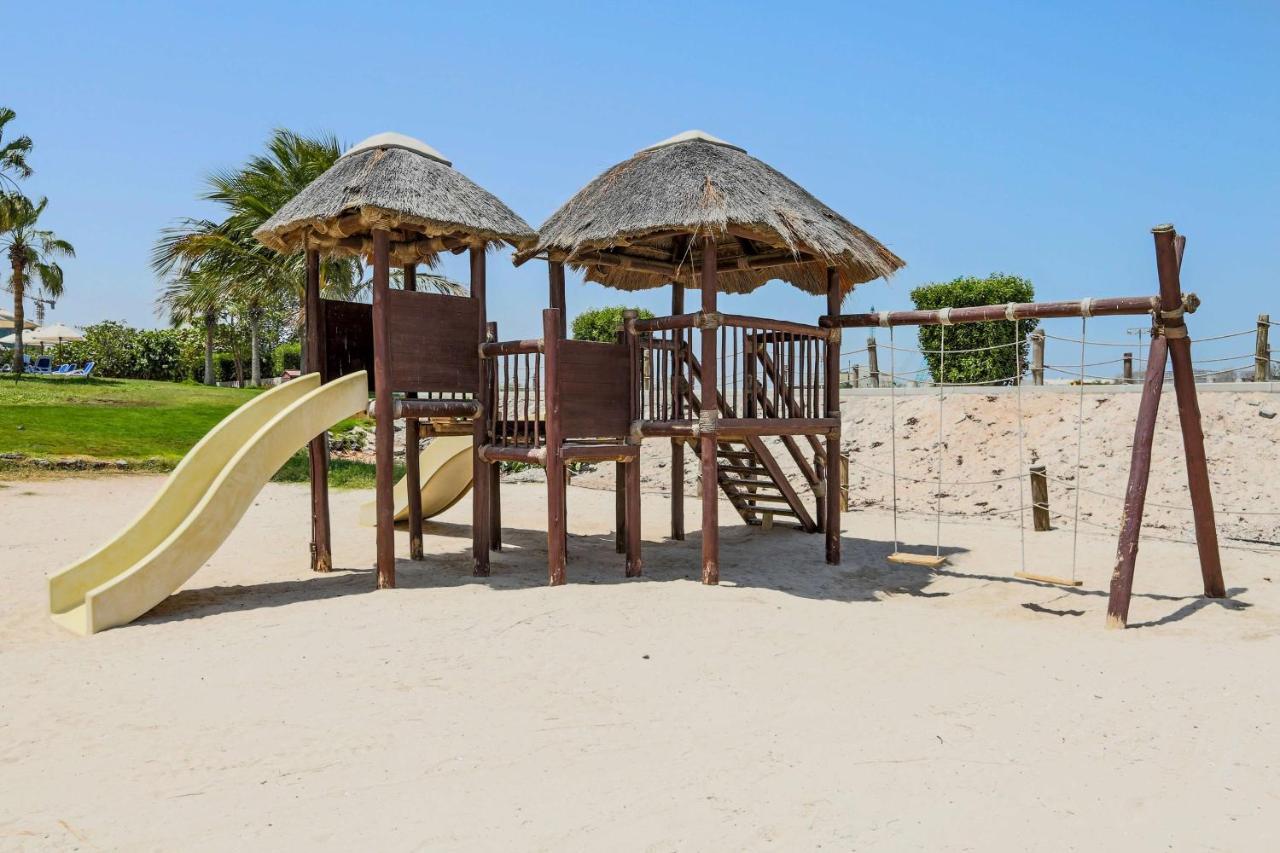 Radisson Blu Resort, Шарджа Экстерьер фото Playground at the park